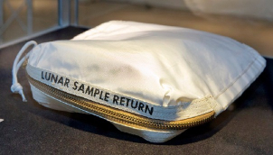 Neil Armstrong's moon dust bag sold for 1.8 million dollars at auction