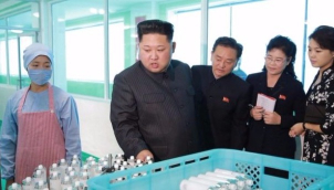 Kim Jong-Un visits cosmetics factory with wife and sister
